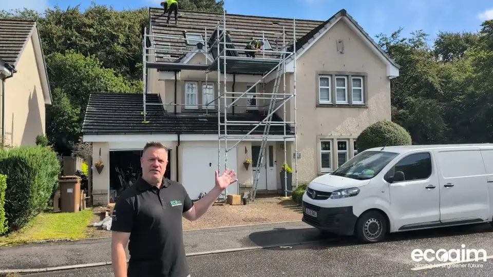 Ecoaim engineers installing solar panels on a Scottish home